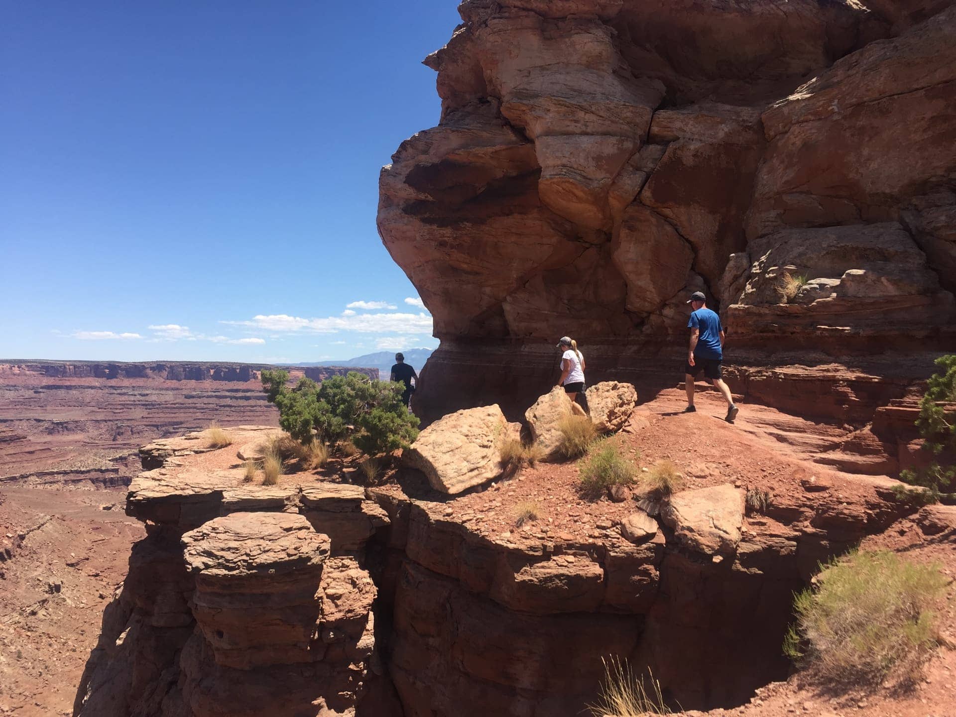 Walking next to a 1000 ft cliff at Canyonlands National Park