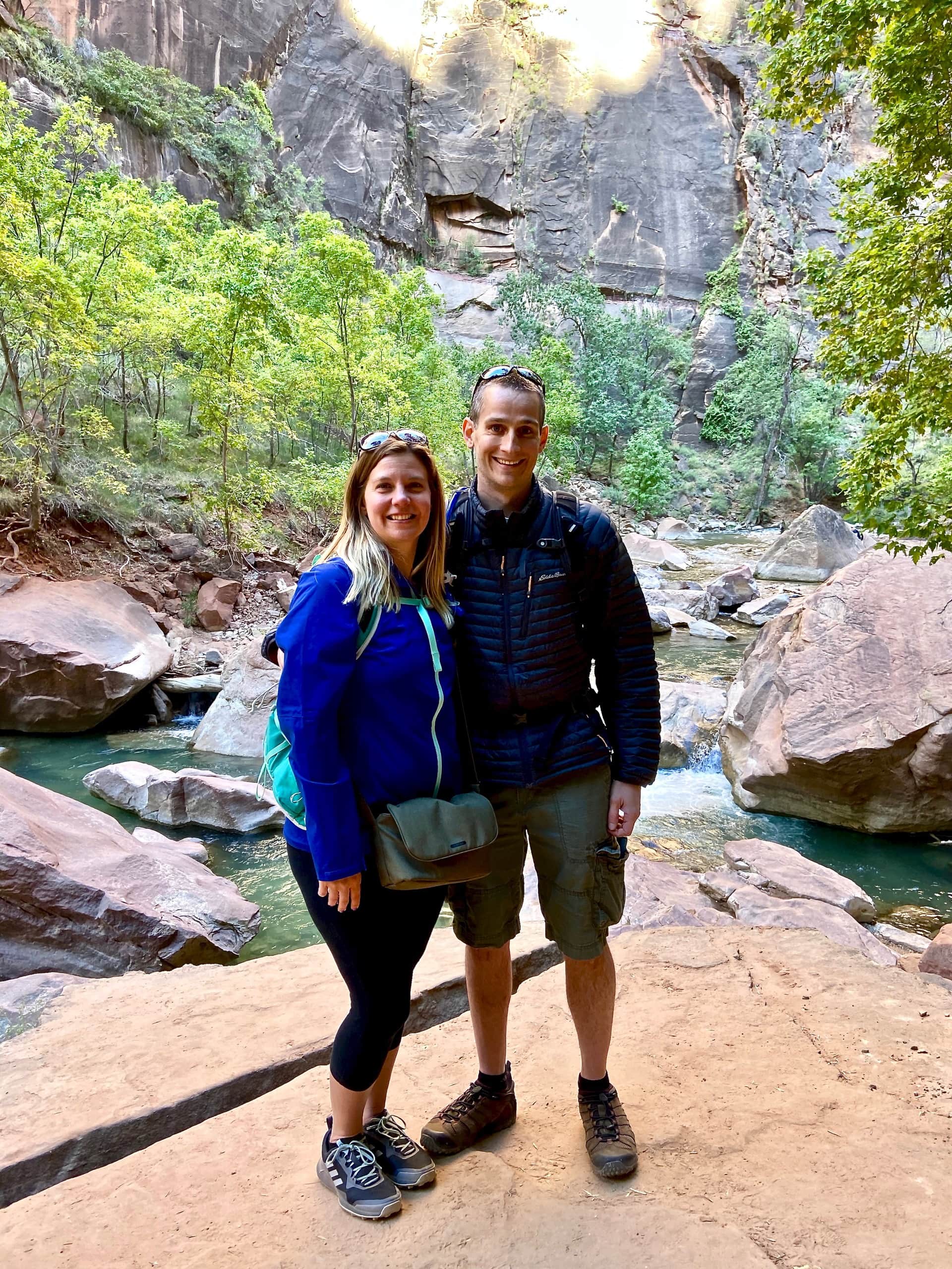 Keith and Lindsey are standing next to the Virgin River on the Riverwalk Trail