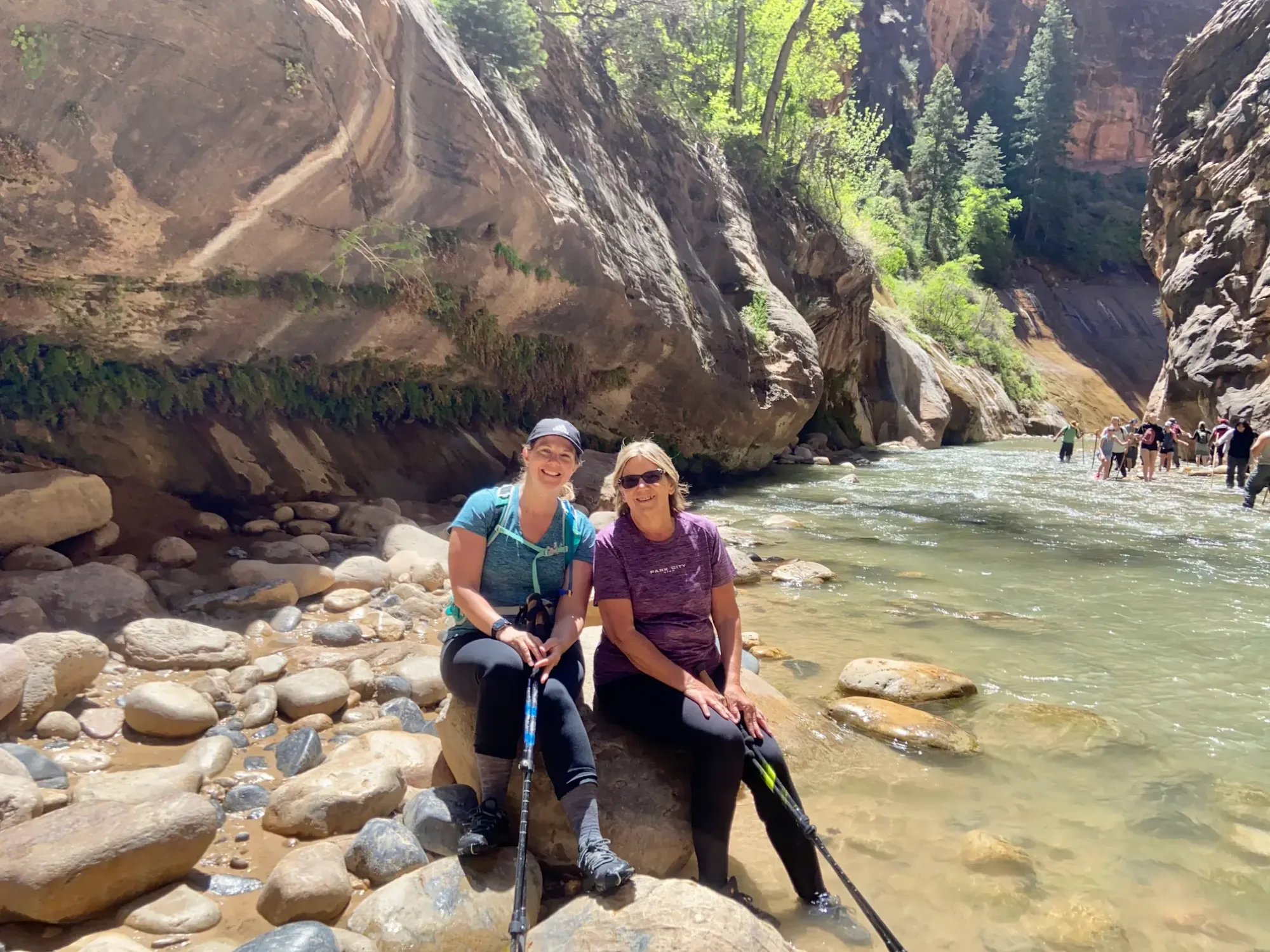 Lindsey and her Mom are hiking The Narrows at Zion National Park