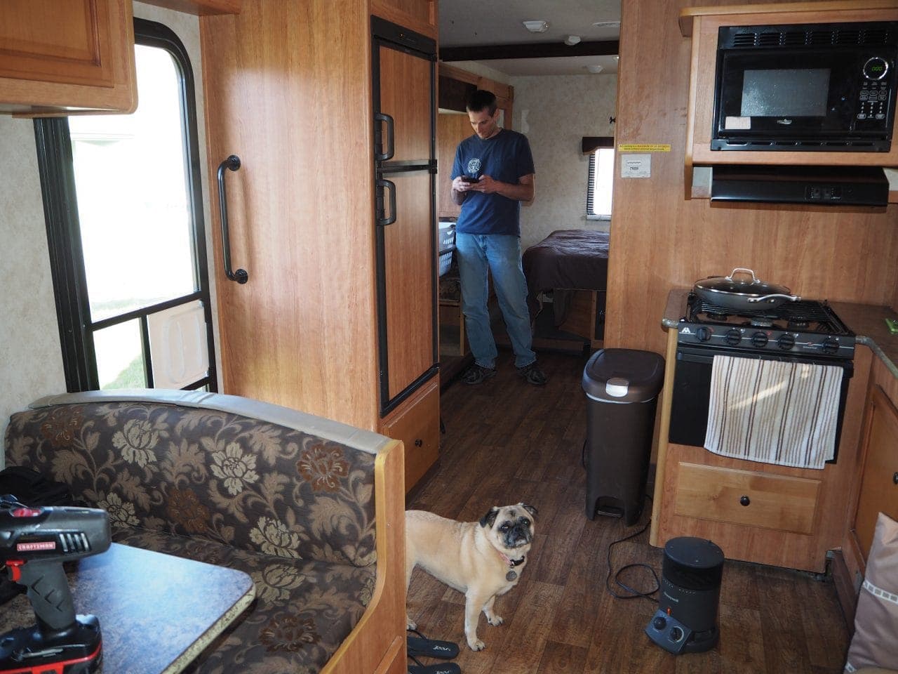 Keith and Lexi working hard in the motorhome