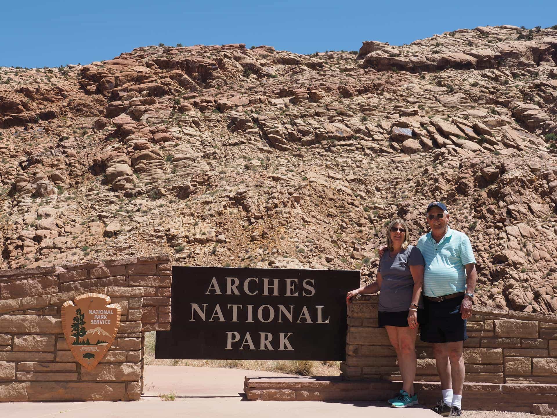 John and Marilyn at the entrance to Arches National Park