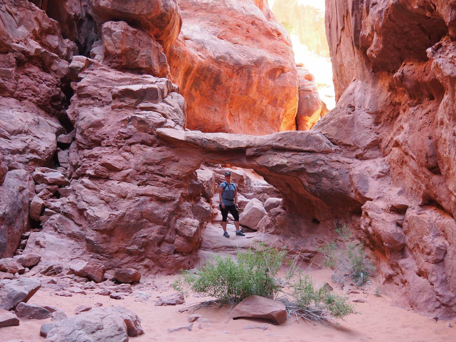 Lindsey standing under an arch in the Fiery Furnace