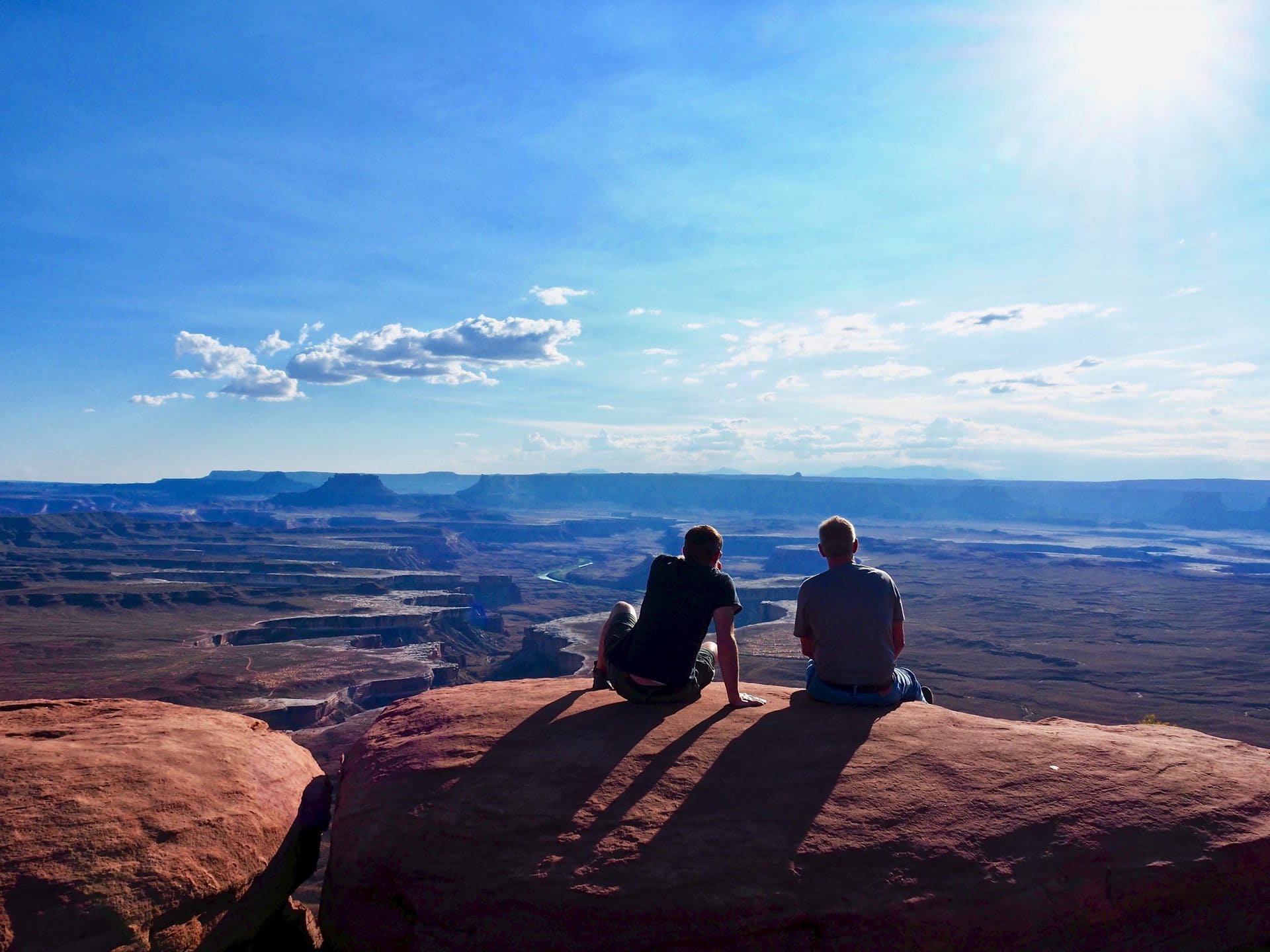 Keith and Lindsey's dad are admiring the views at Canyonlands National Park