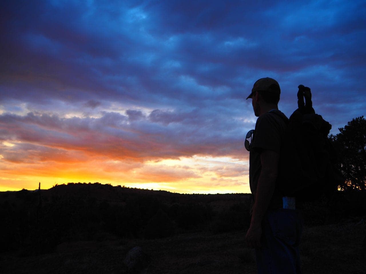 Keith in the shadows as the sun sets over the park