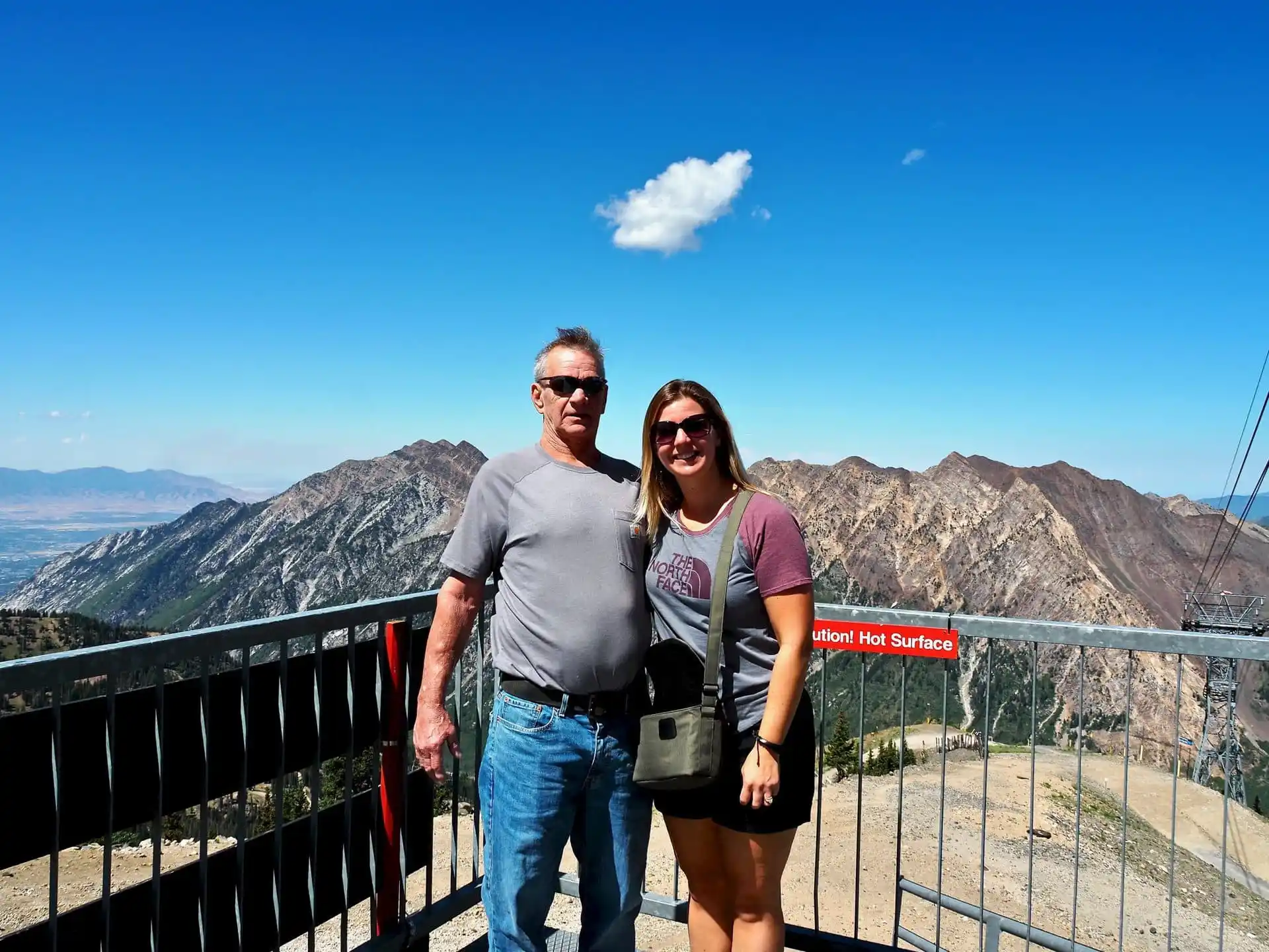 Lindsey and her dad at the top of Hidden Peak at Snowbird Ski Resort