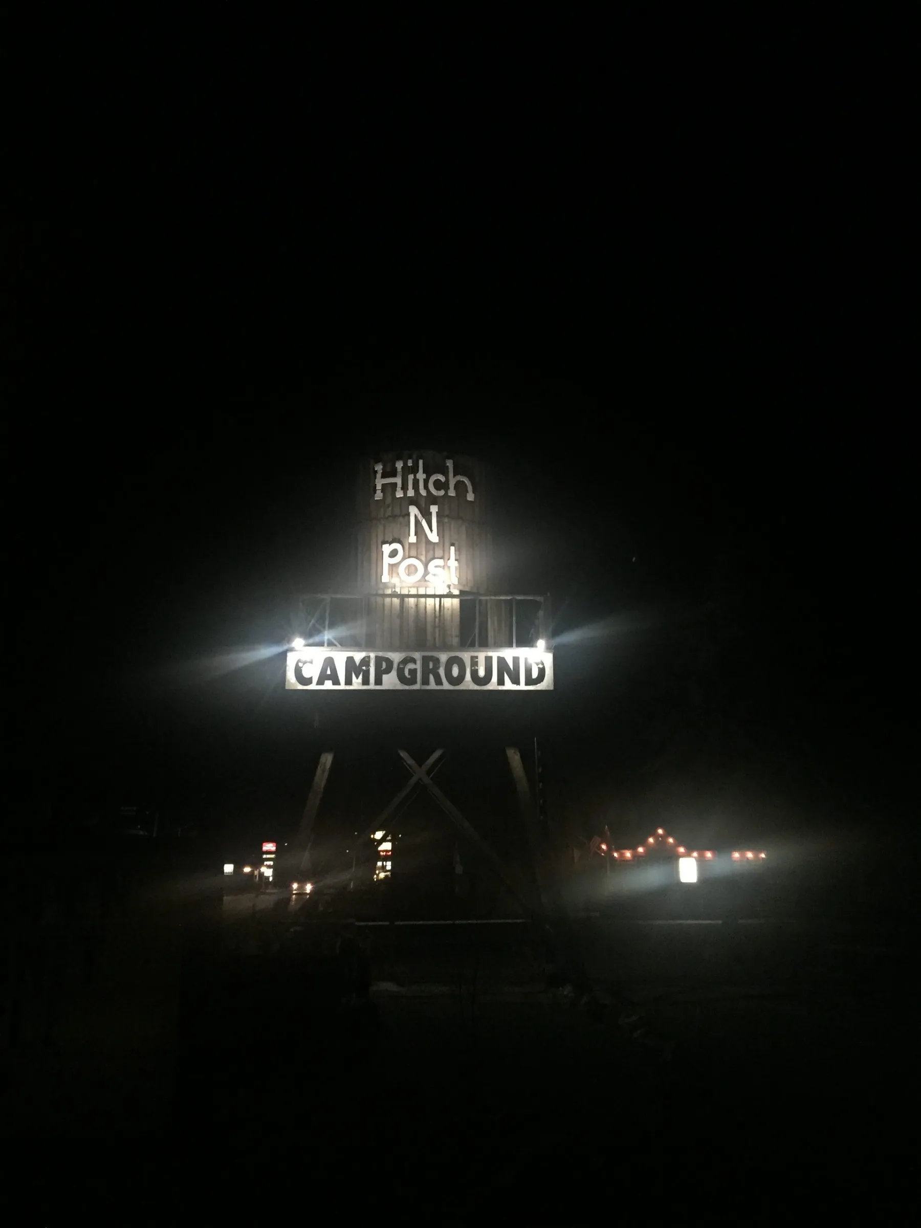 The Hitch-n-Post Campground water tower at night