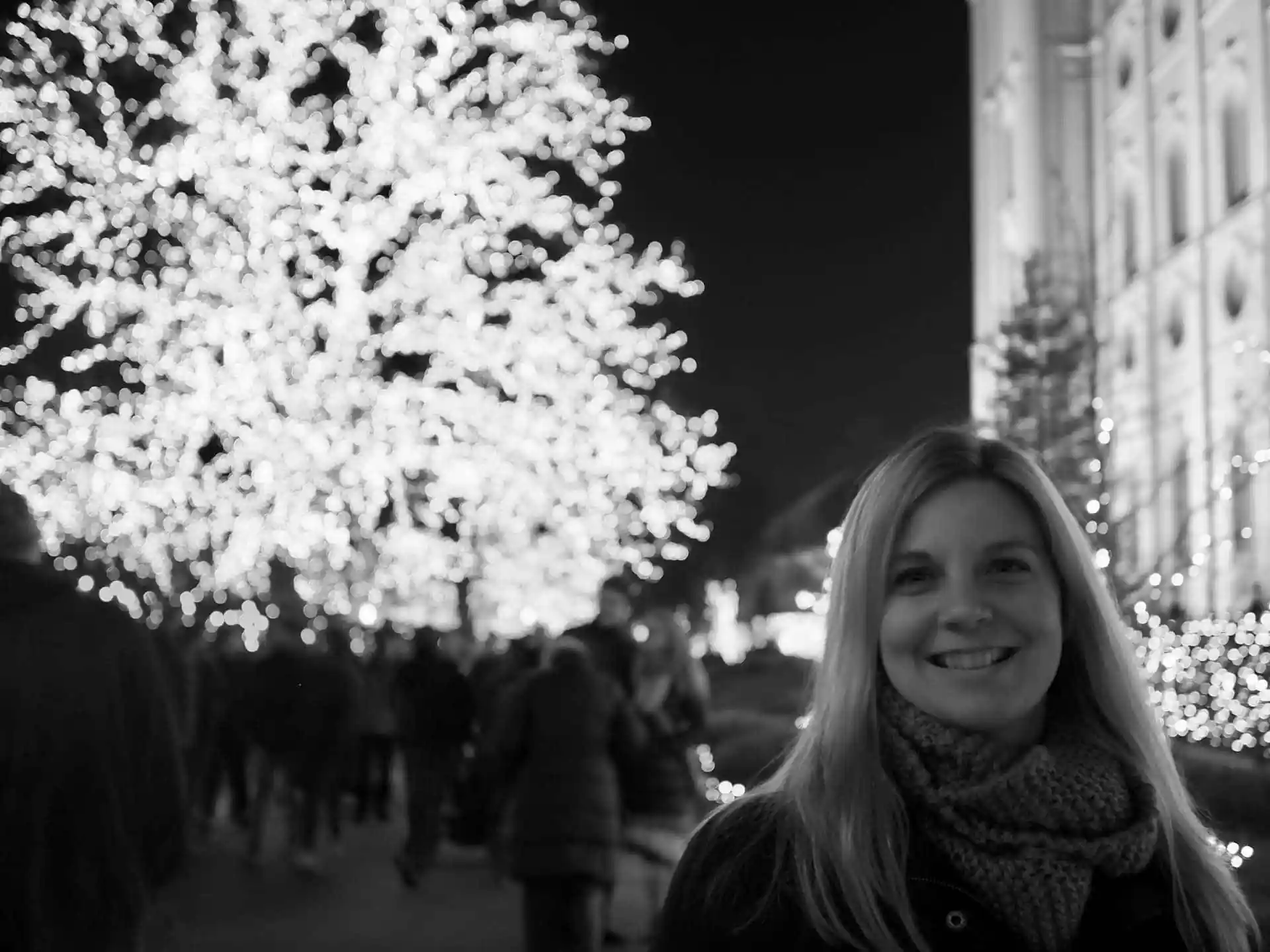 An artistic black and white photo of Lindsey at Temple Square