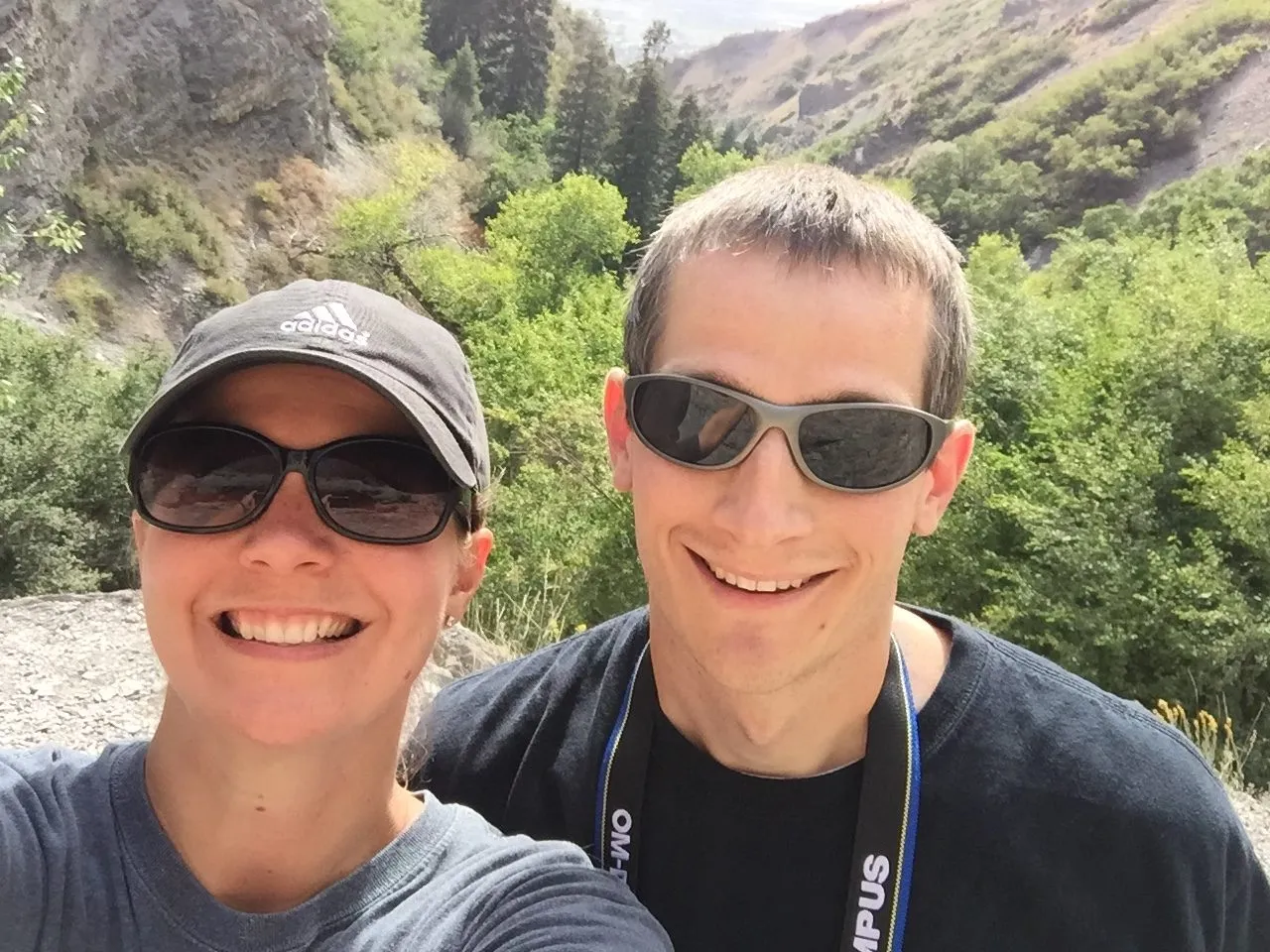 Keith and Lindsey taking a selfie while on a hike