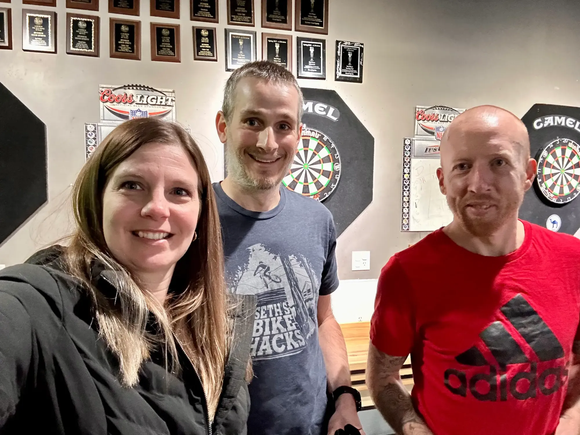 Lindsey, Keith, and Randy are playing darts at a local bar.