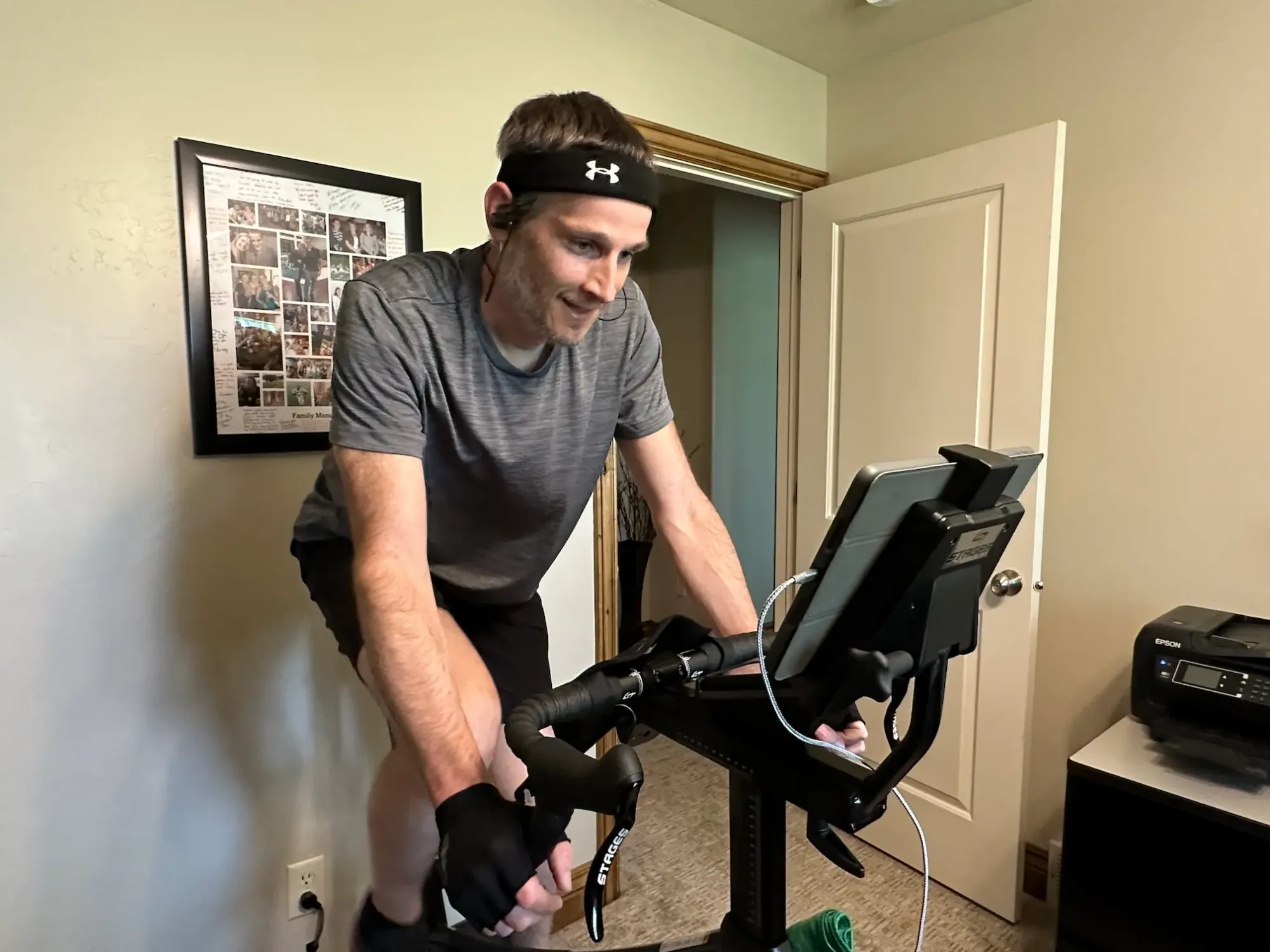 Keith is smiling as he works out on his Stages SB20 Smart Bike.