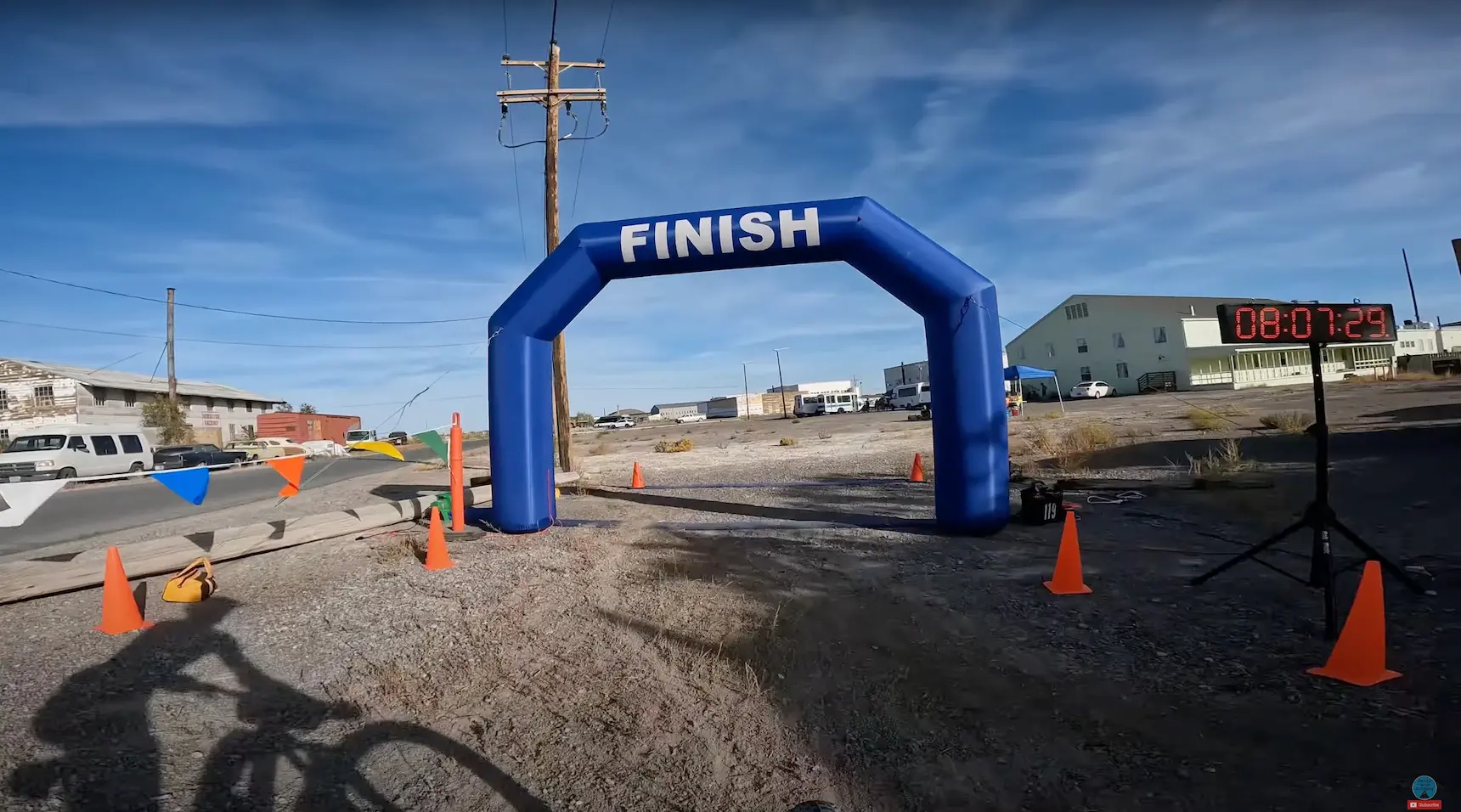 Keith is about to cross the finish line at the Salty Lizard 100 gravel race in Wendover, NV