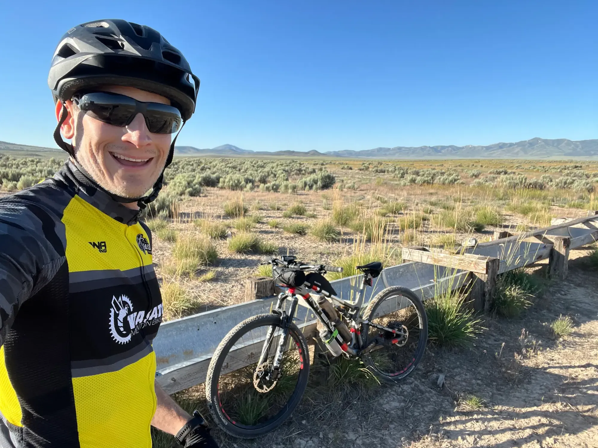 Keith is taking a selfie during a self-supported adventure ride through the west desert area of Utah Valley