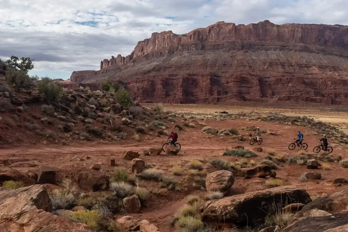 Riding mountain bikes through the desert trails in Moab, UT