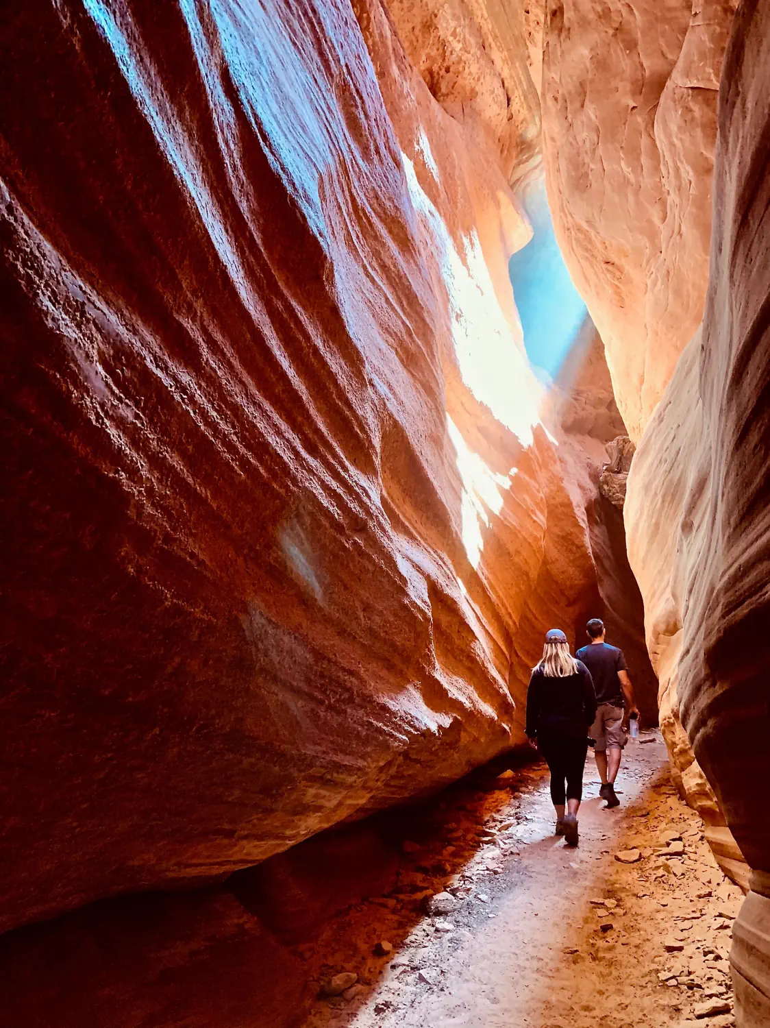 Hiking through a slot canyon during our excursion