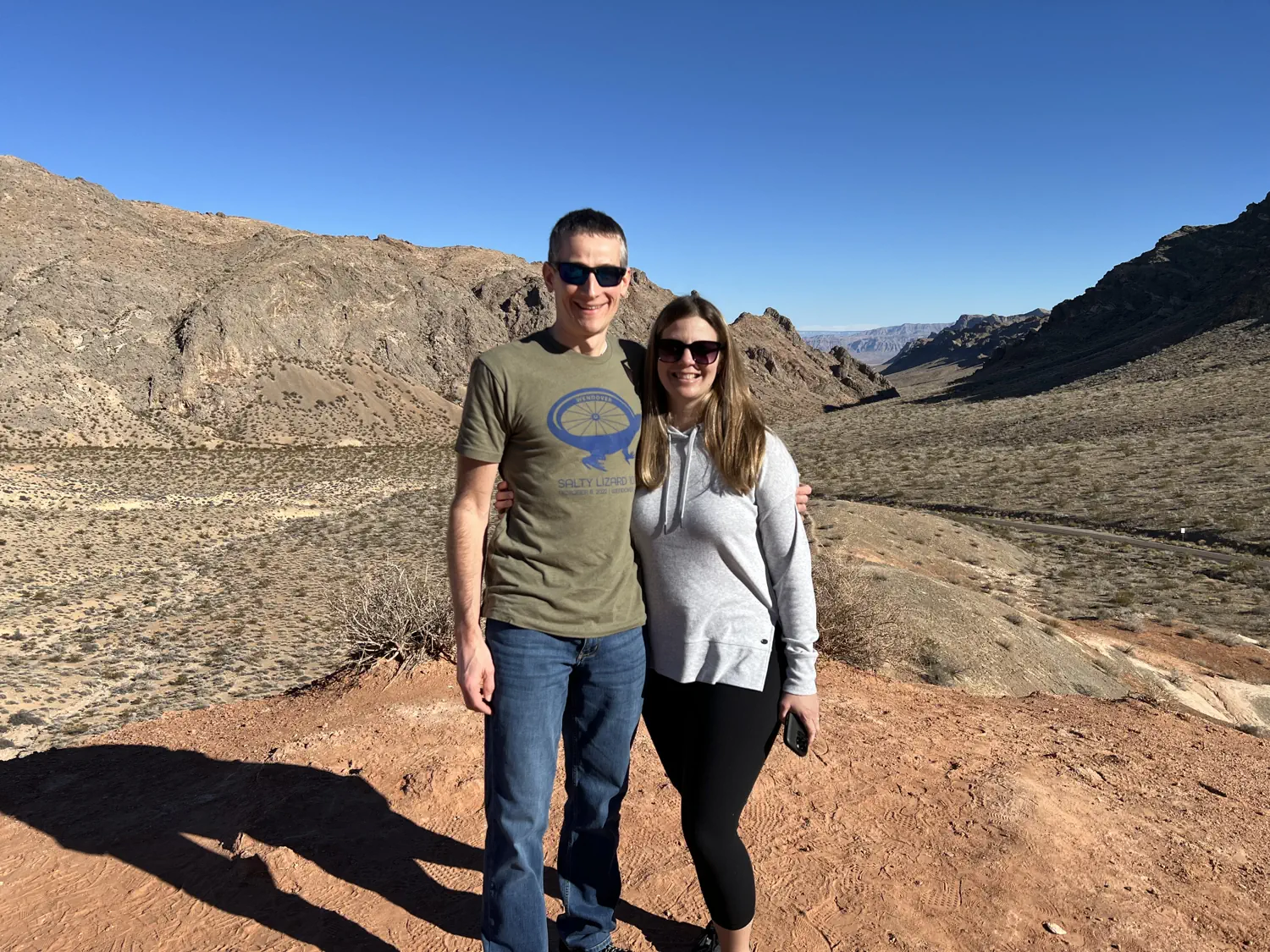 Keith and Lindsey are standing at an overlook at the entrance to Valley of Fire State Park