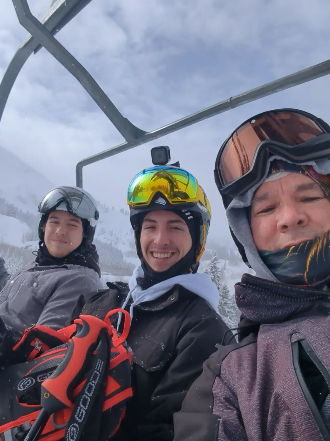 Barry, Joe, and Cooper are enjoying a powder day at Brighton Resort in Big Cottonwood Canyon