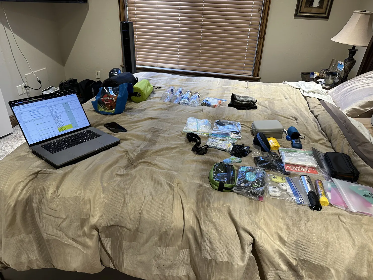 Keith is going over his Tour Divide packing spreadsheet and laying out the items