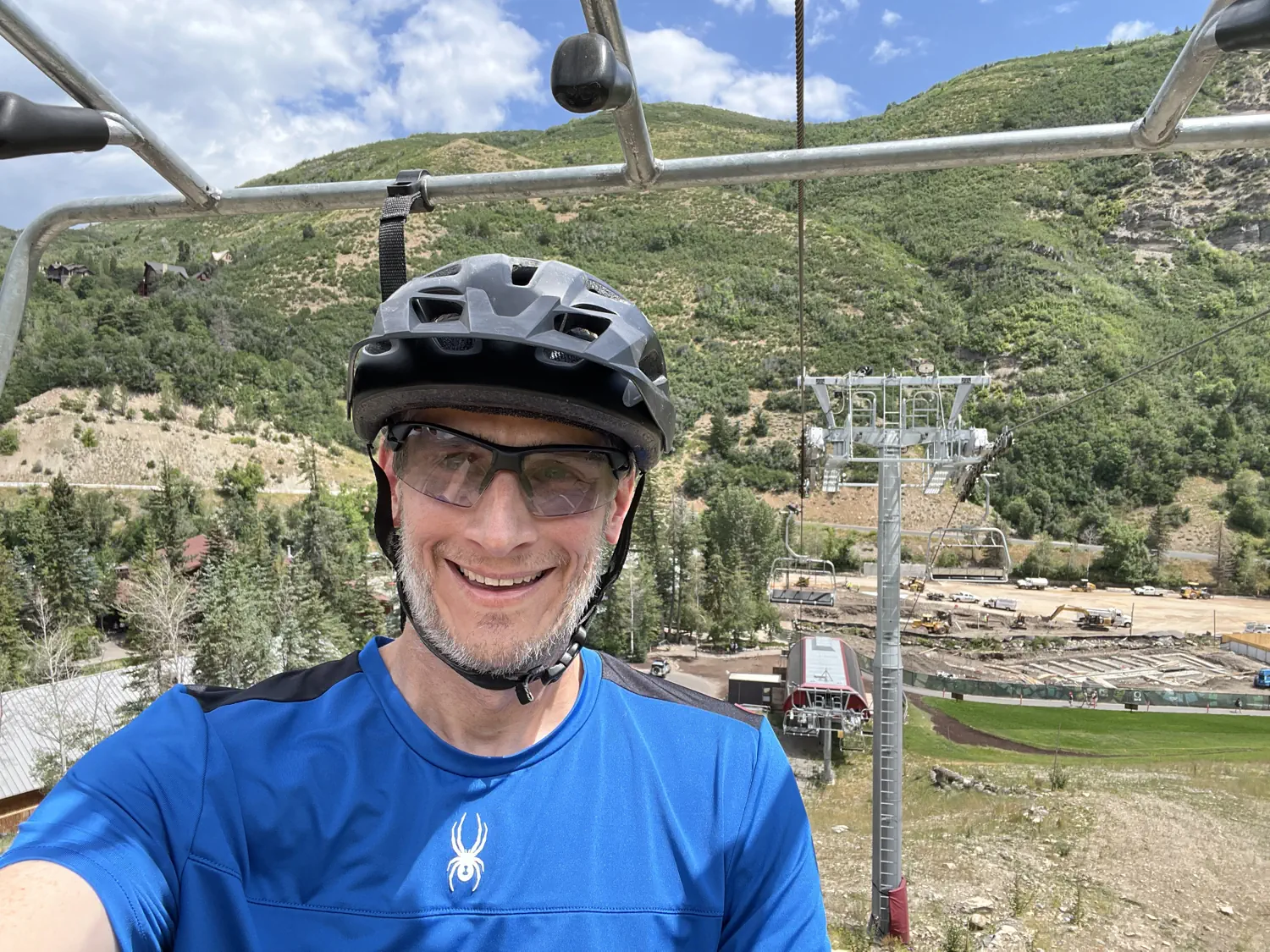 Keith is riding on the lift and is excited to start his first lap of downhill MTB at Sundance Mountain Resort