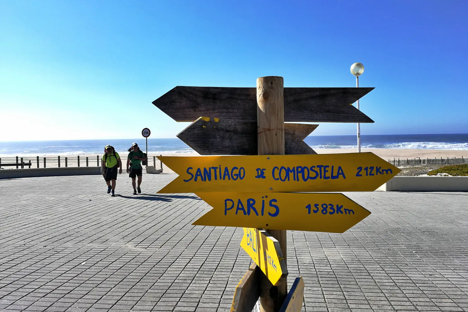 Signs pointing to Santiago de Compostela along the Camino Portuguese Coastal route (Source: CaminhoPortoSantiago.com)