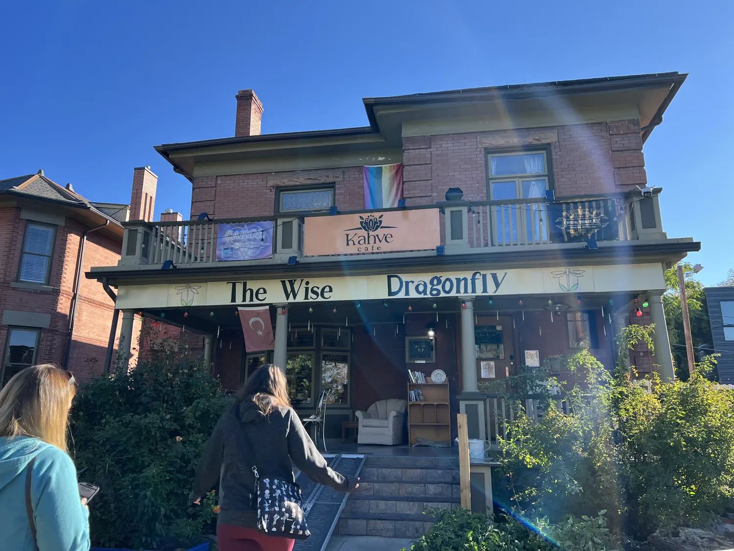 Walking up to Kahve Cafe in Salt Lake City, UT with our friend