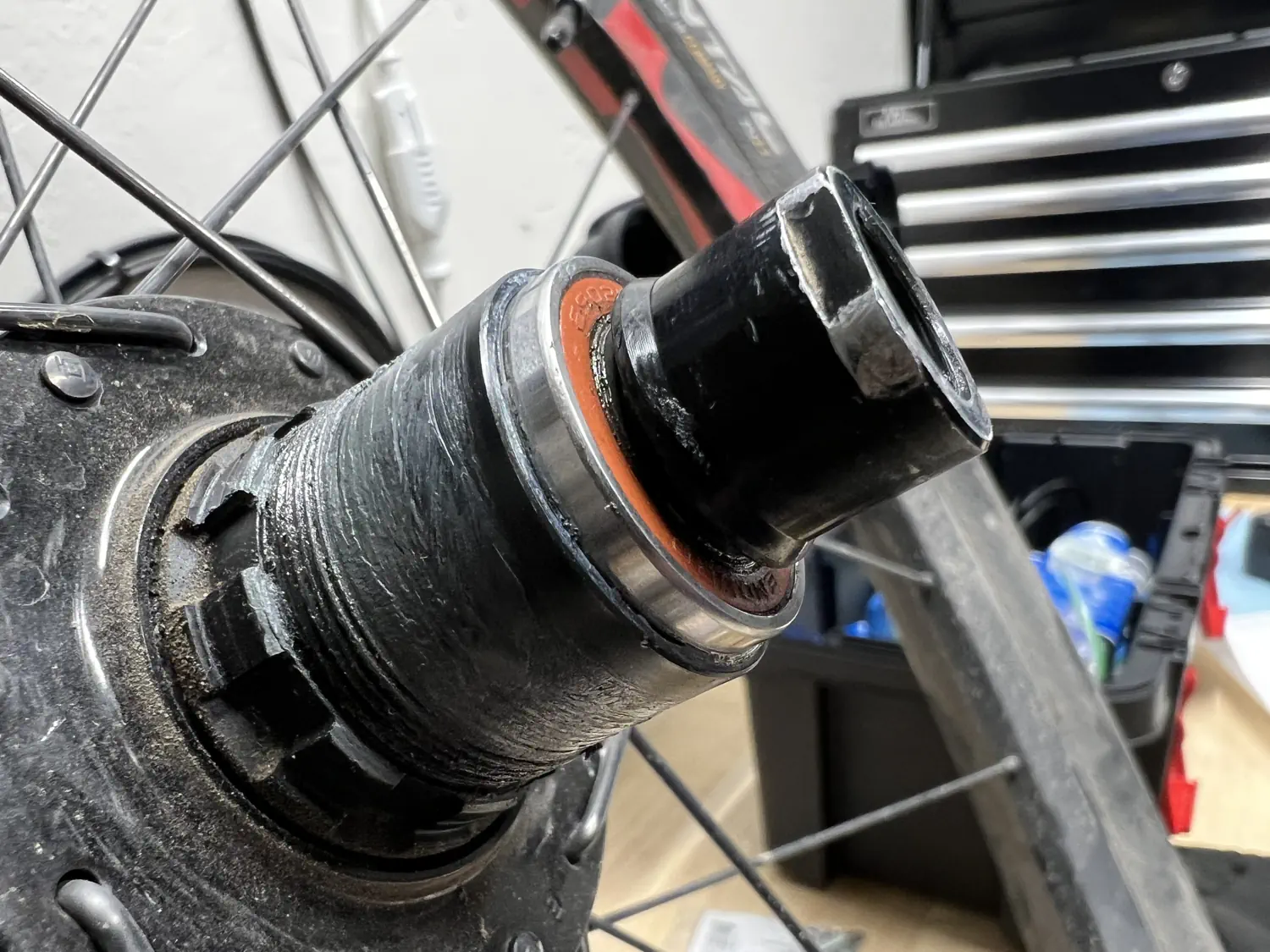 Keith's rear wheel axle was slightly loose, causing a rattling noise