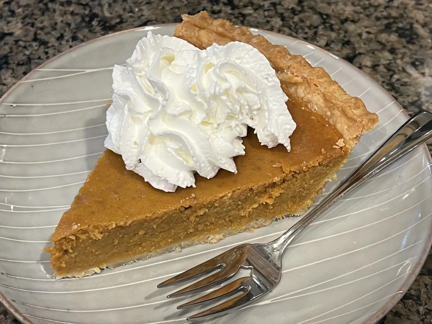Pumpkin pie with whipped cream! YUM! 😋