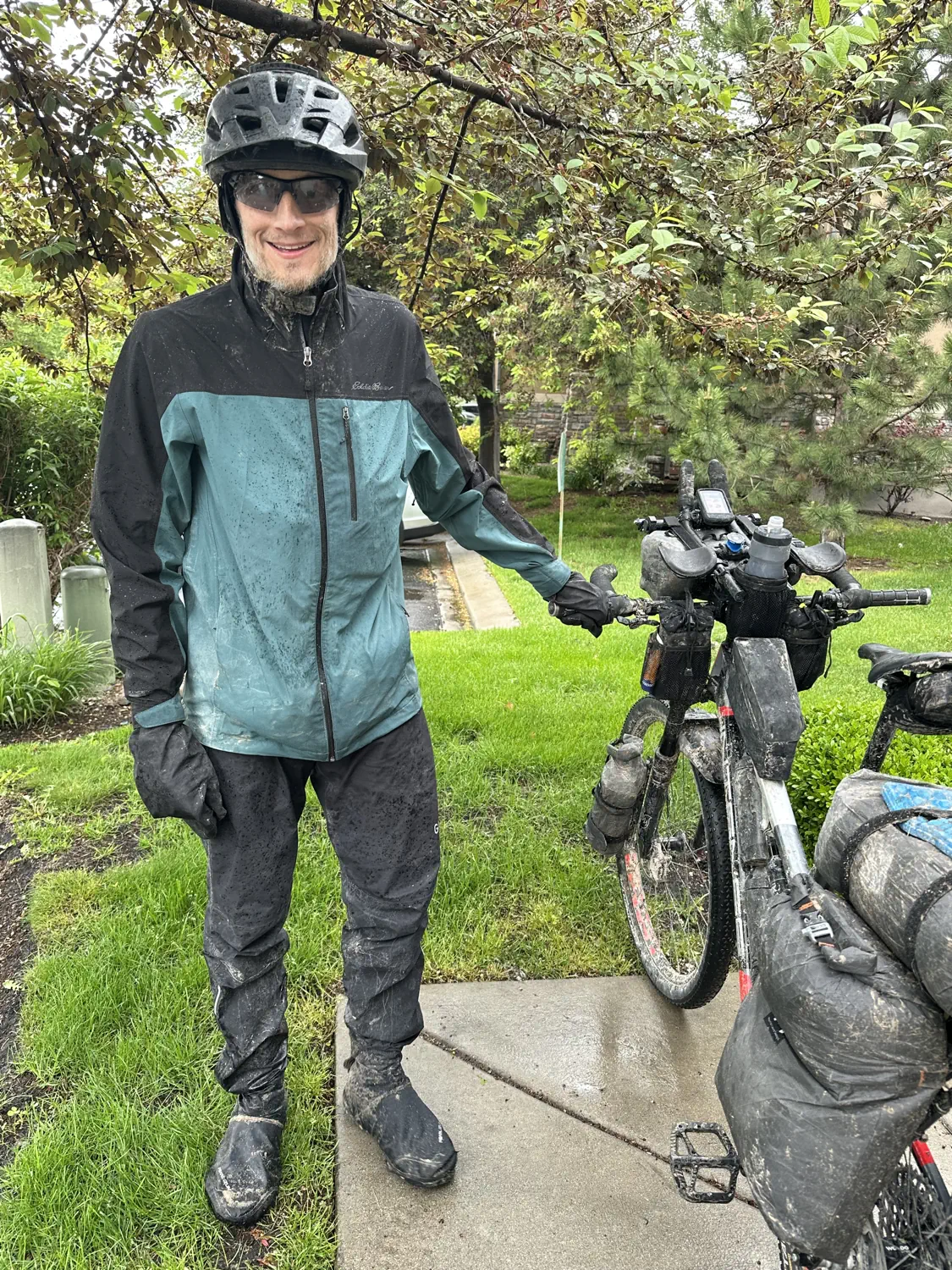 Keith is in his full rain gear after completing an extremely wet desert training ride