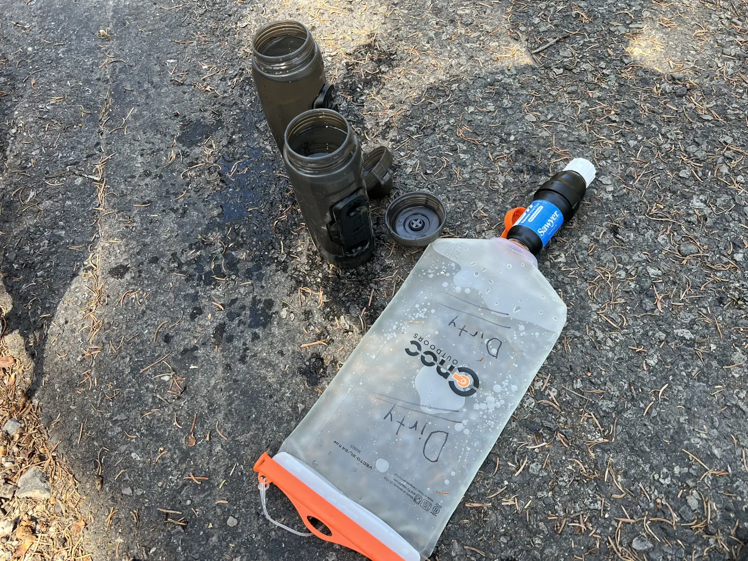 Gallery of Keith's water filter system, including a Cnoc Vecto bladder and Sawyer Squeeze filter