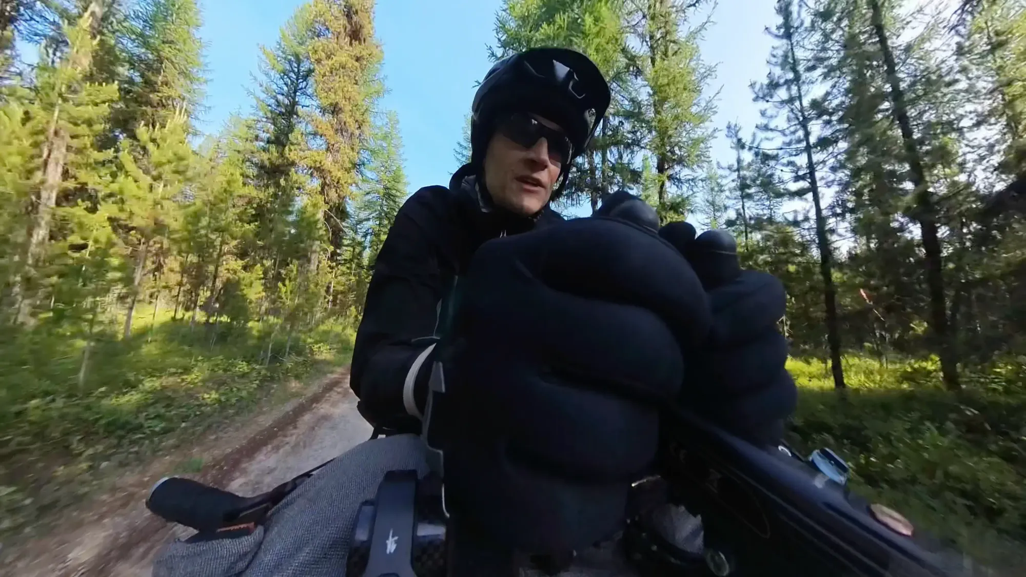 Keith is relaxing in his aero bars as he prepares for the next big climb of the day